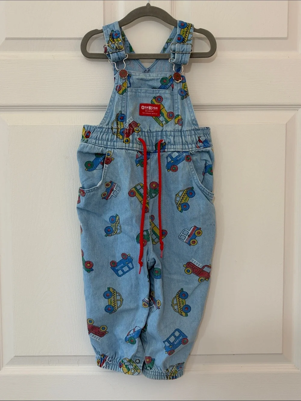 Vintage OshKosh B'gosh Light Blue Denim Overalls with Car Print